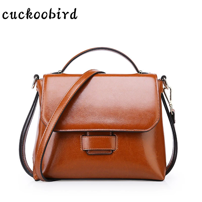 red cuckoo black cross body bag