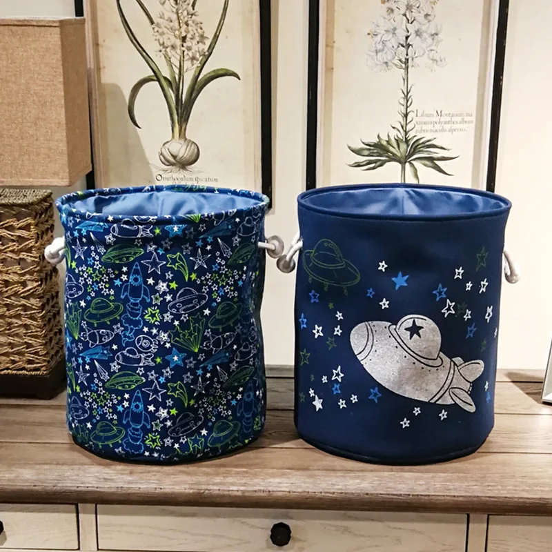

Christmas 1PC Laundry Baskets Spaceship Stars And Moon Series Pattern Toys Barrels Canvas Dirty Clothes Barrels Home Decorations