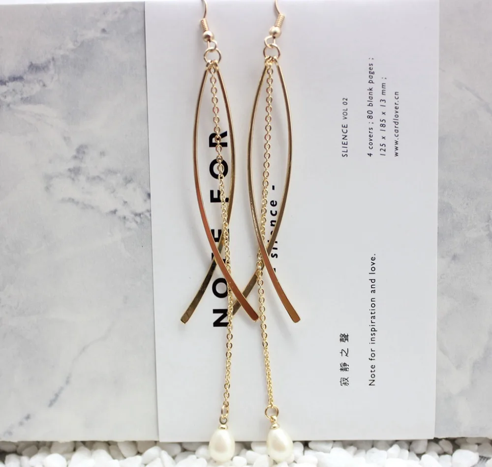 

2017 new pearl jewelry Vintage Contracted abstract art Copper simple fish long Drop Earrings for Women