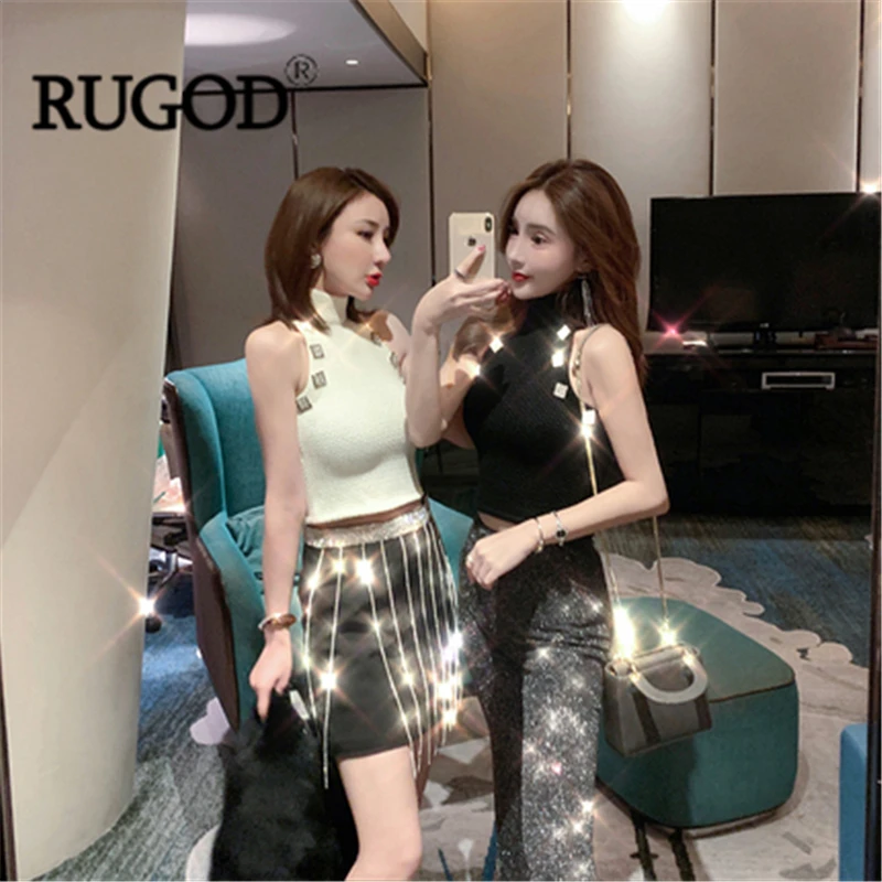 Женское мини платье RUGOD черное облегающее трапециевидной формы с кисточками и