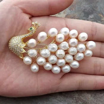 

White Pearl Cz Pave Peacock Brooch