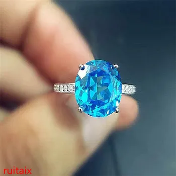 

KJJEAXCMY fine jewelry 925 Sterling silver inlaid with blue topaz ring gold and silver color female.NM