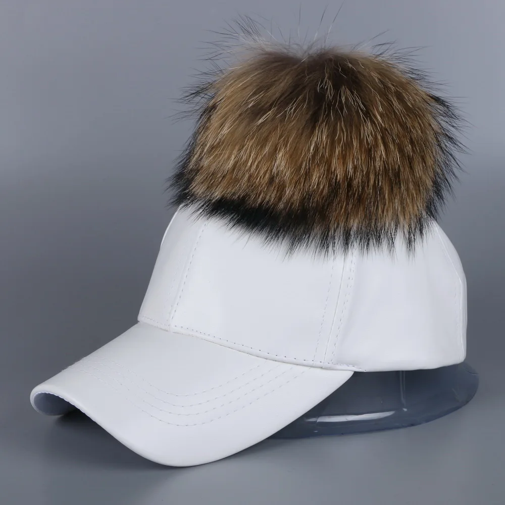 leather baseball cap with fur ball on top