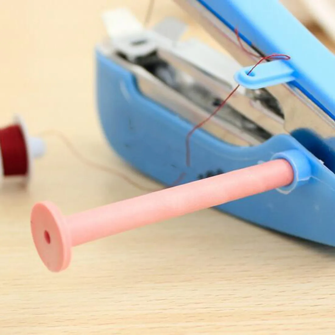 New 1Pcs Portable Needlework Cordless Mini Hand-Held Clothes Fabrics Sewing Machine