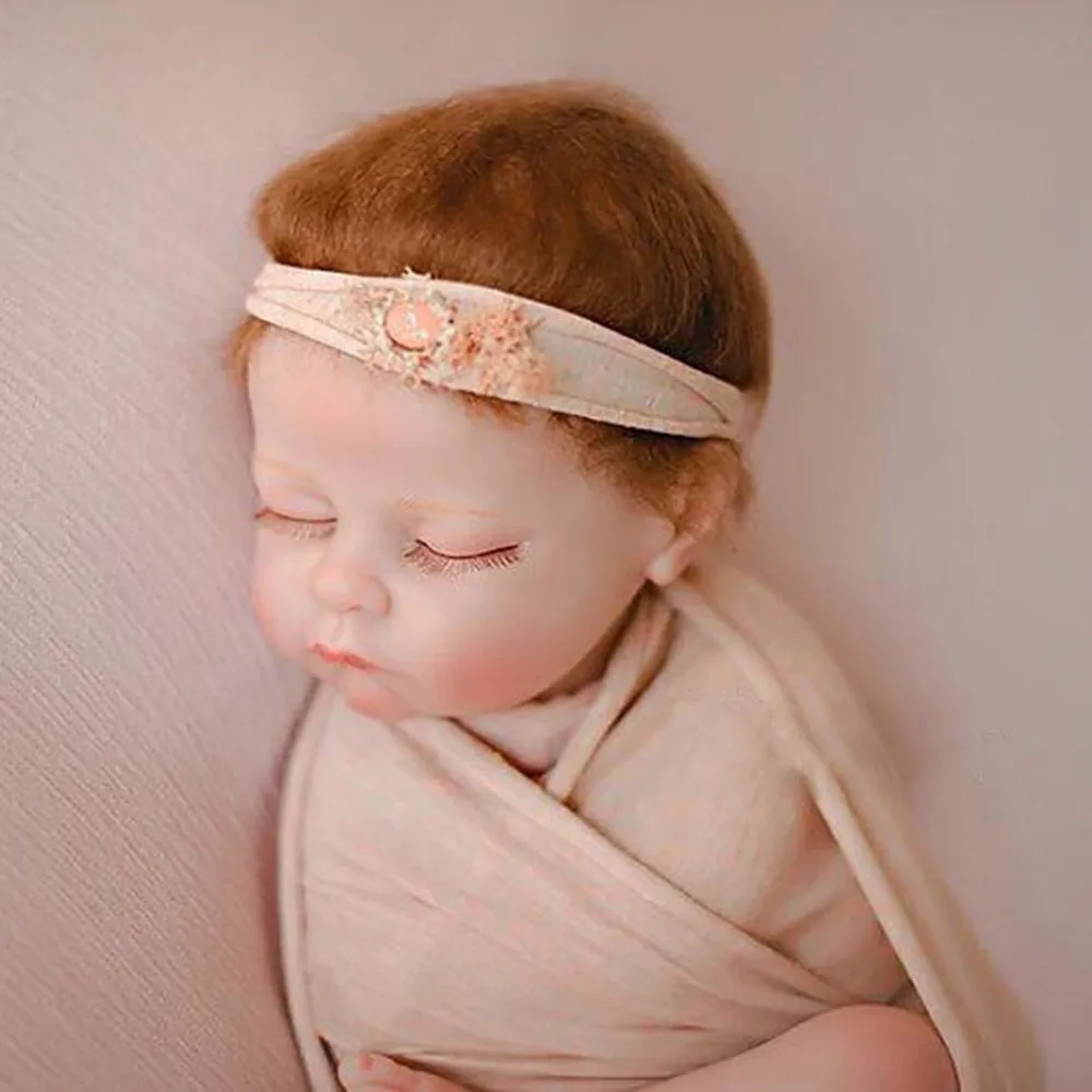 posing baby doll for photography
