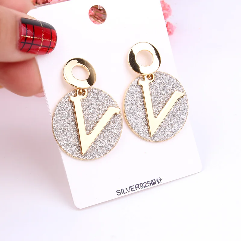 

Fanqieliu Environment-friendly Alloy Grind Luxury Gold & Silver Letter V Drop & Dangle Earrings For Women 2018 Fashion FQL10580