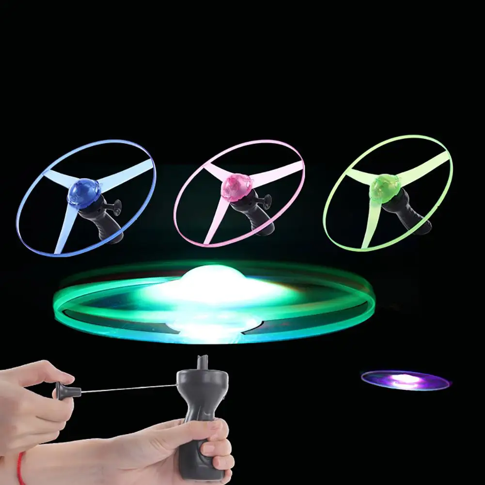 

LED Light up Spinning Flying Disc Saucer Pull String Kids Toy Party Supplies