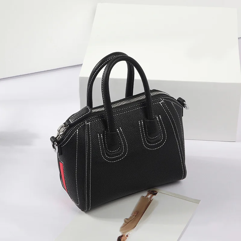 Simple solid color fashion brand Korean smiley face designer handbags high quality lychee soft face Genuine Leather women bag