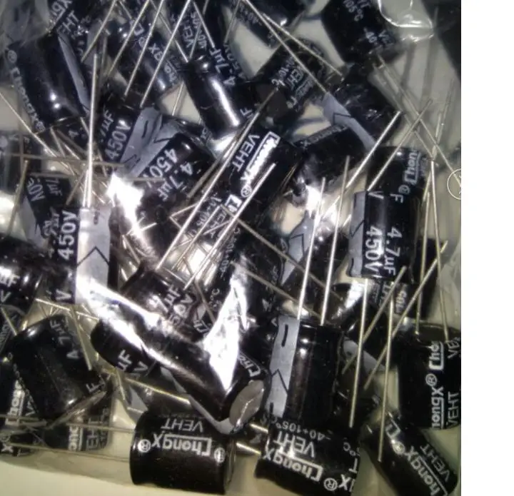 

50pcs electrolytic capacitor 450 v4. 7 4.7 uf450v uf size: 10 * 13