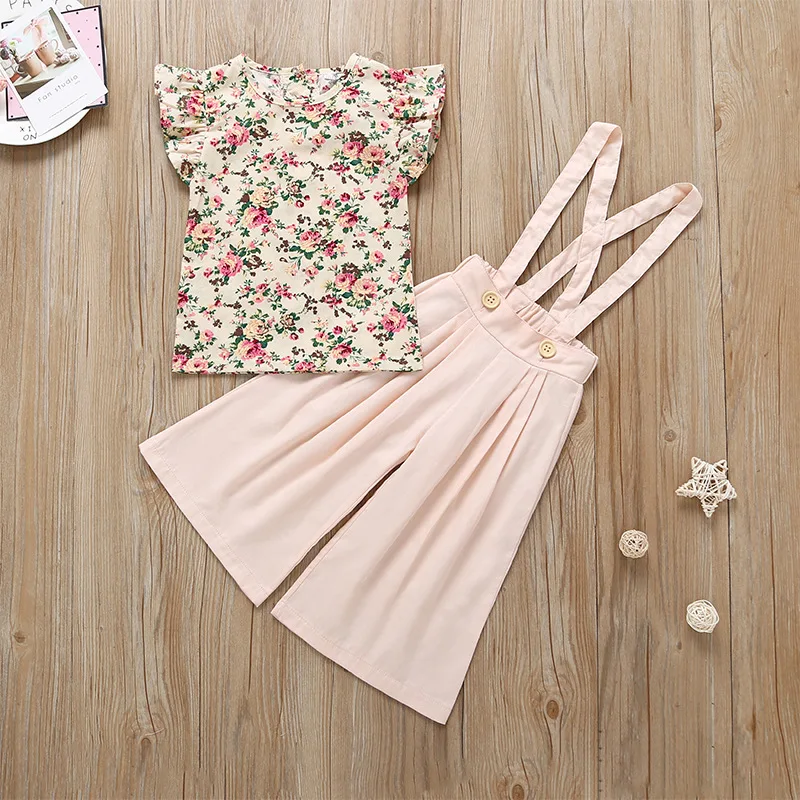 

The latest summer explosion models girls print tops sling wide leg pants two sets of floral trousers
