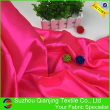 Цена по прейскуранту завода неоновая розовая блестящая атласная ткань для украшения модного платья