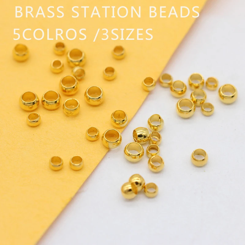 100 gold beads 2 mm. 