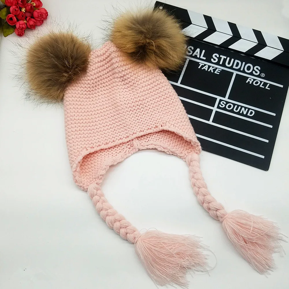 

2019Real fur ball hat warm parent-child braid knit hat cute earmuffs Lei Feng hat autumn and winter double ball cap