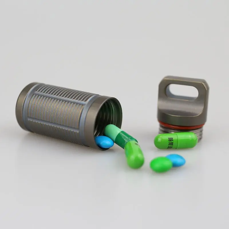 Soporte para pastillas de titanio resistente al agua de alta calidad/contenedor de emergencia para campamento al aire libre botella de medicina cápsula caja 2,6*1\