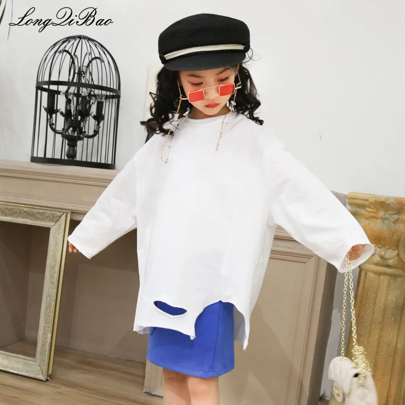 

Girls Korean version of the cotton round neck hole irregular loose wild T-shirt 2019 spring new children's shirt tide