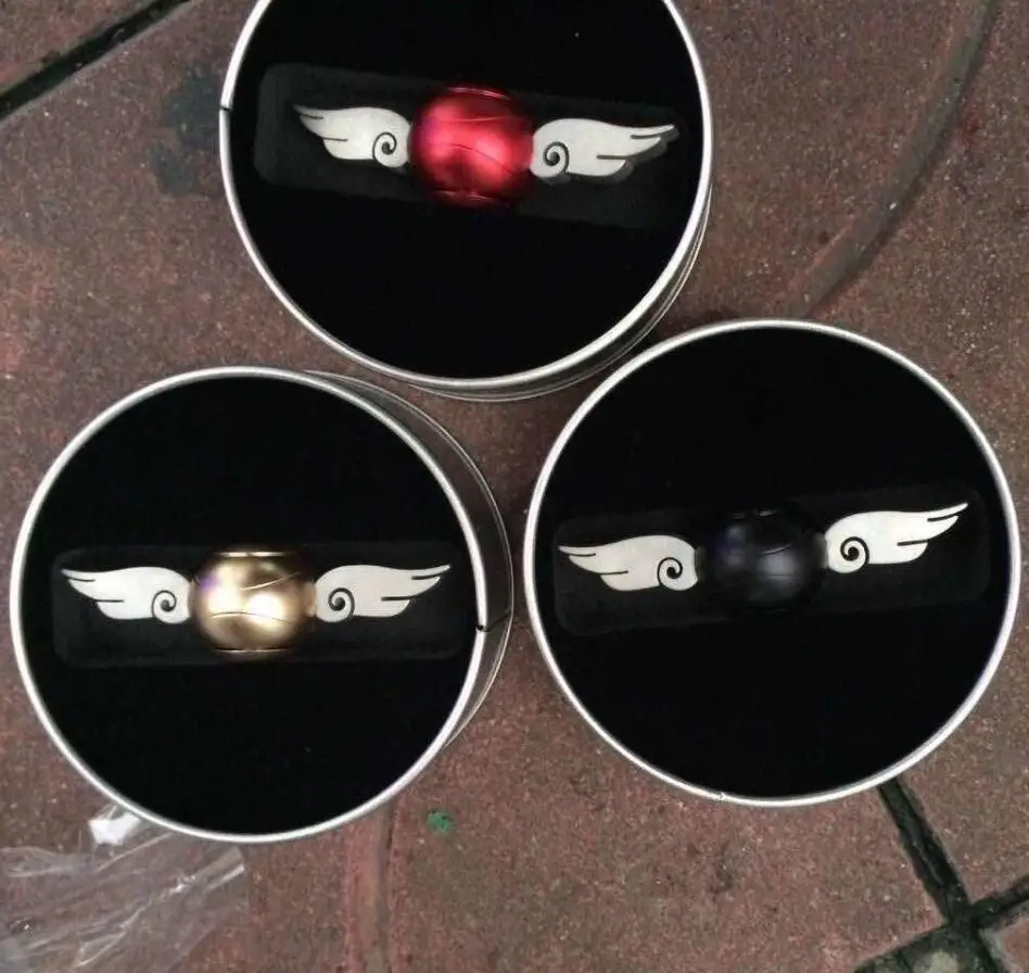 Mais novo Girador Pomo de ouro Harry Potter Fãs Fidget Girador Girador Girador do Dedo do Metal Asas de Anjo Mão Brinquedos Com Caixa de Metal