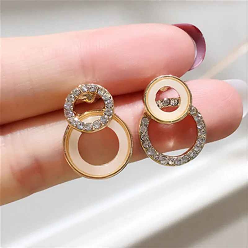 

Geometric circular resin stud earrings female Classic golden crystal stud earrings for women Hollow circle small stud earrings