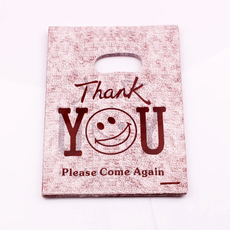 

Wholesale Gift Bags 100pcs/lot Brown Plastic Handle Bag With "Thank You" Printing Boutique Jewelry Gift Clothes Toys Packaging