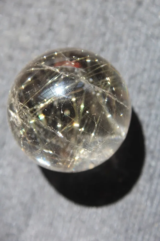 

Natural rutilated quartz crystal ball