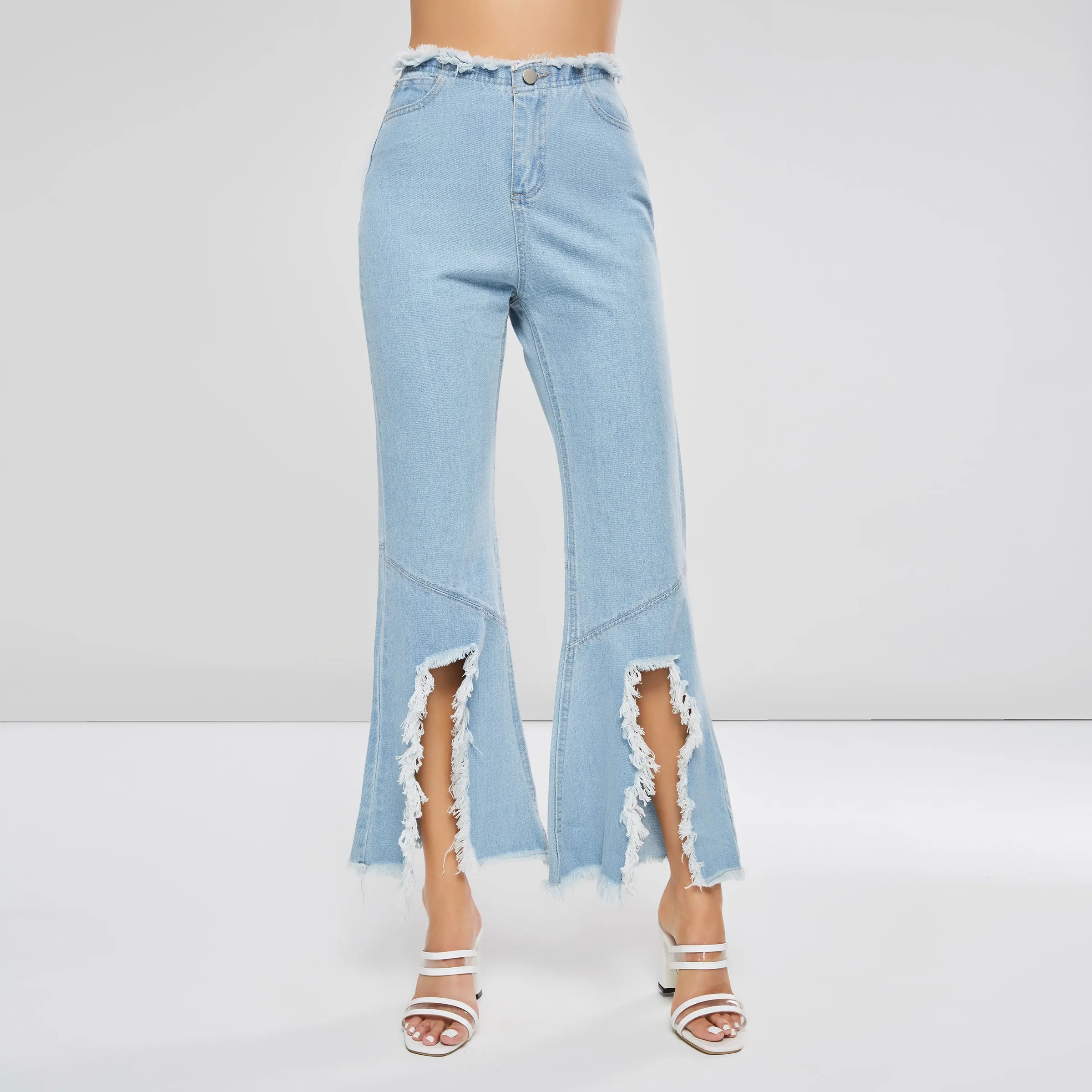 Модные уличные рваные джинсы для женщин Винтаж расклешенные брюки для девочек отверстия разделение кисточкой осень леди Street повседневное
