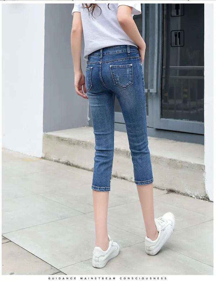 Lxunyi капри для женщин; Большие размеры узкие джинсы женщина Высокая Талия рваные со стразами стрейч зауженные джинсы до середины икры Длина