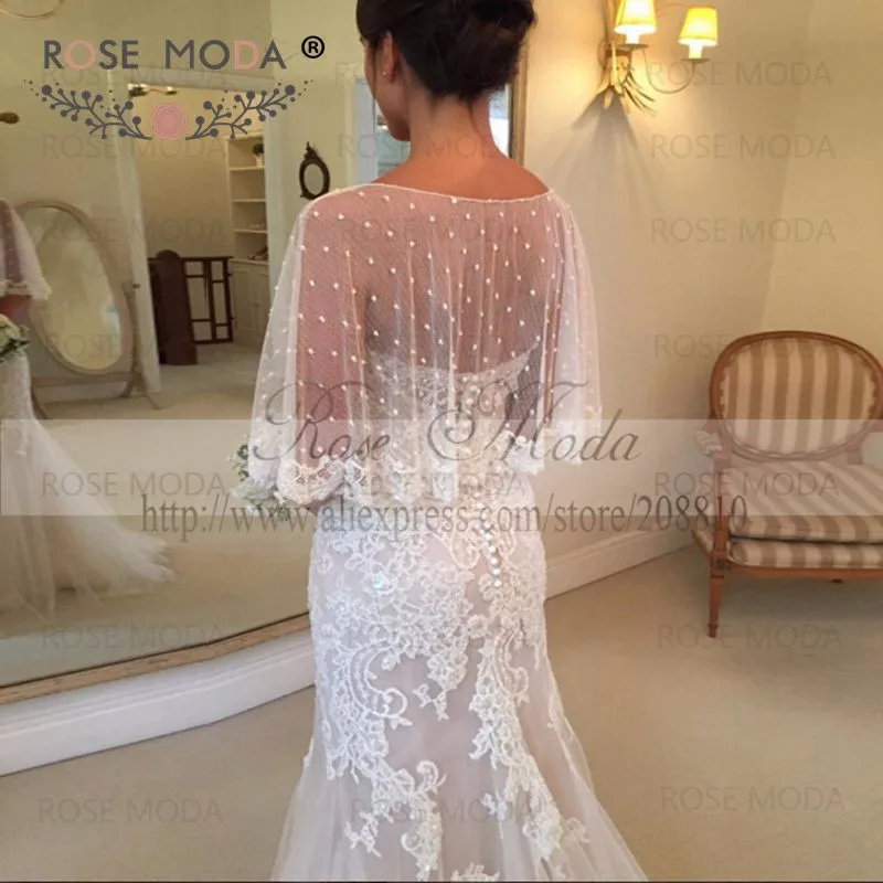 lace wedding dress with caped