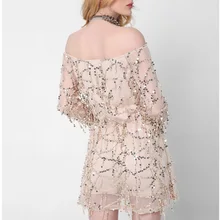 Europe and the United States women's new long sleeved collar strapless dress sexy clothing sequined tassels
