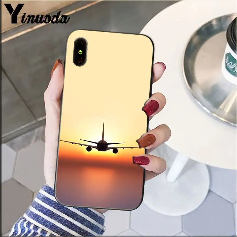 Airplane travel in the sunset