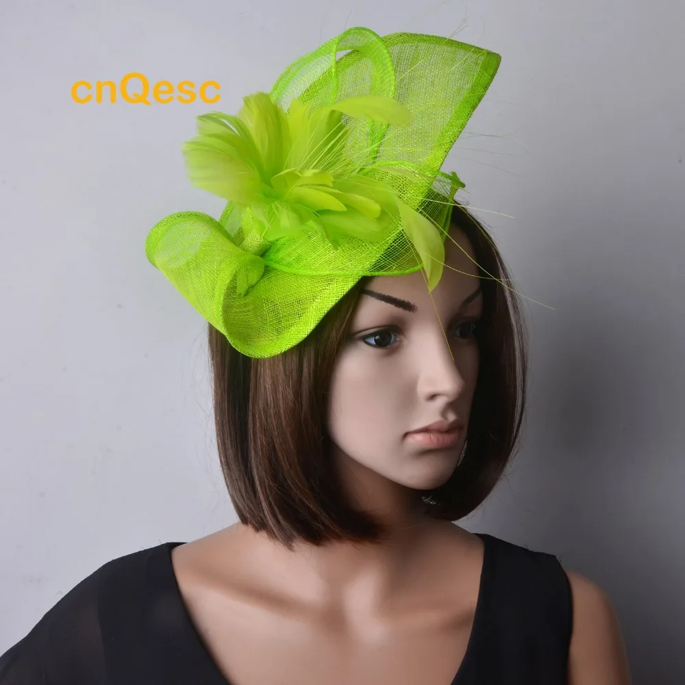 

Green Sinamay fascinator feather flower hat for Wedding party Races.