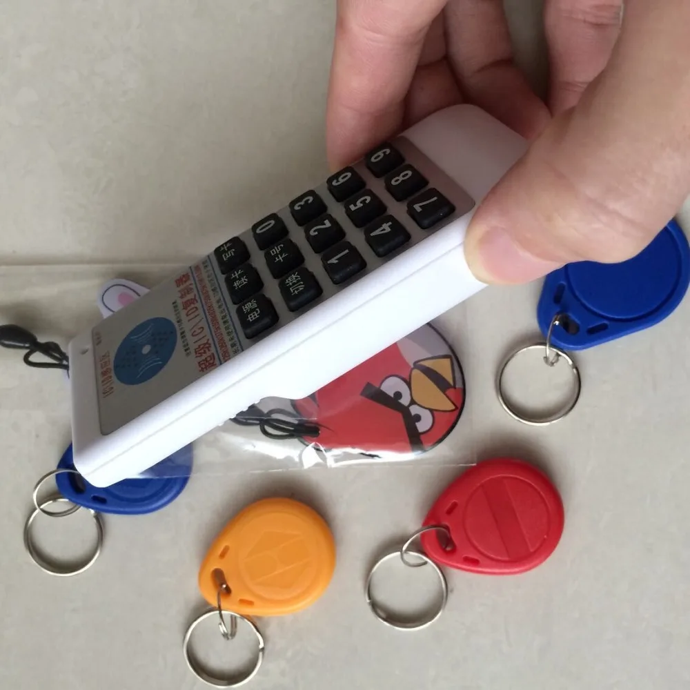 

Handheld RFID NFC Copier ID/IC Reader Writer+ 5x125KHZ T5577 Keyfobs+ 5x 13.56mhz UID Card+ 2x250khz/375khz/500khz Key Tags