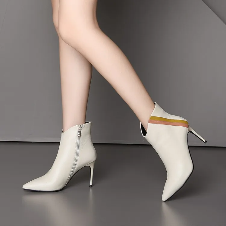

Autumn European and American style new leather Chelsea boots side zipper color matching boots stiletto pointed women's boots.