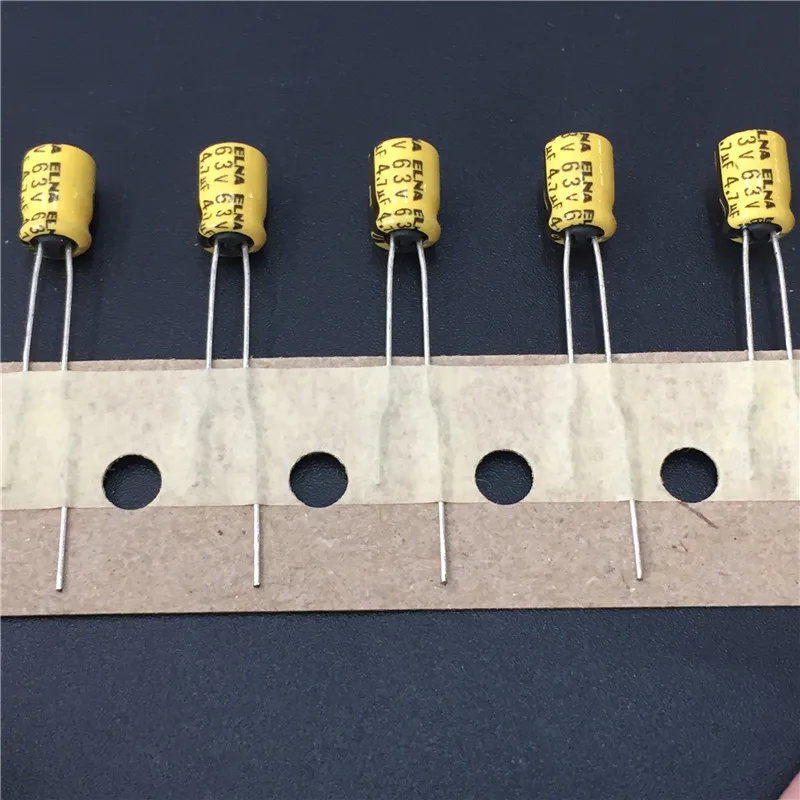100pcs 4.7uF 63V ELNA Yellow 5x7mm 63V4.7uF Audio capacitorin Capacitors from Electronic