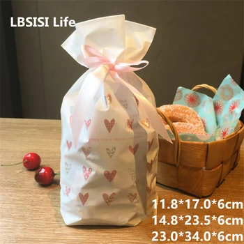 

LBSISI Life 50pcs/lot Love Heart White Plastic Drawstring Bag Cookie Snack Candy Bag Birthday Party Wedding Decor Gift Bags