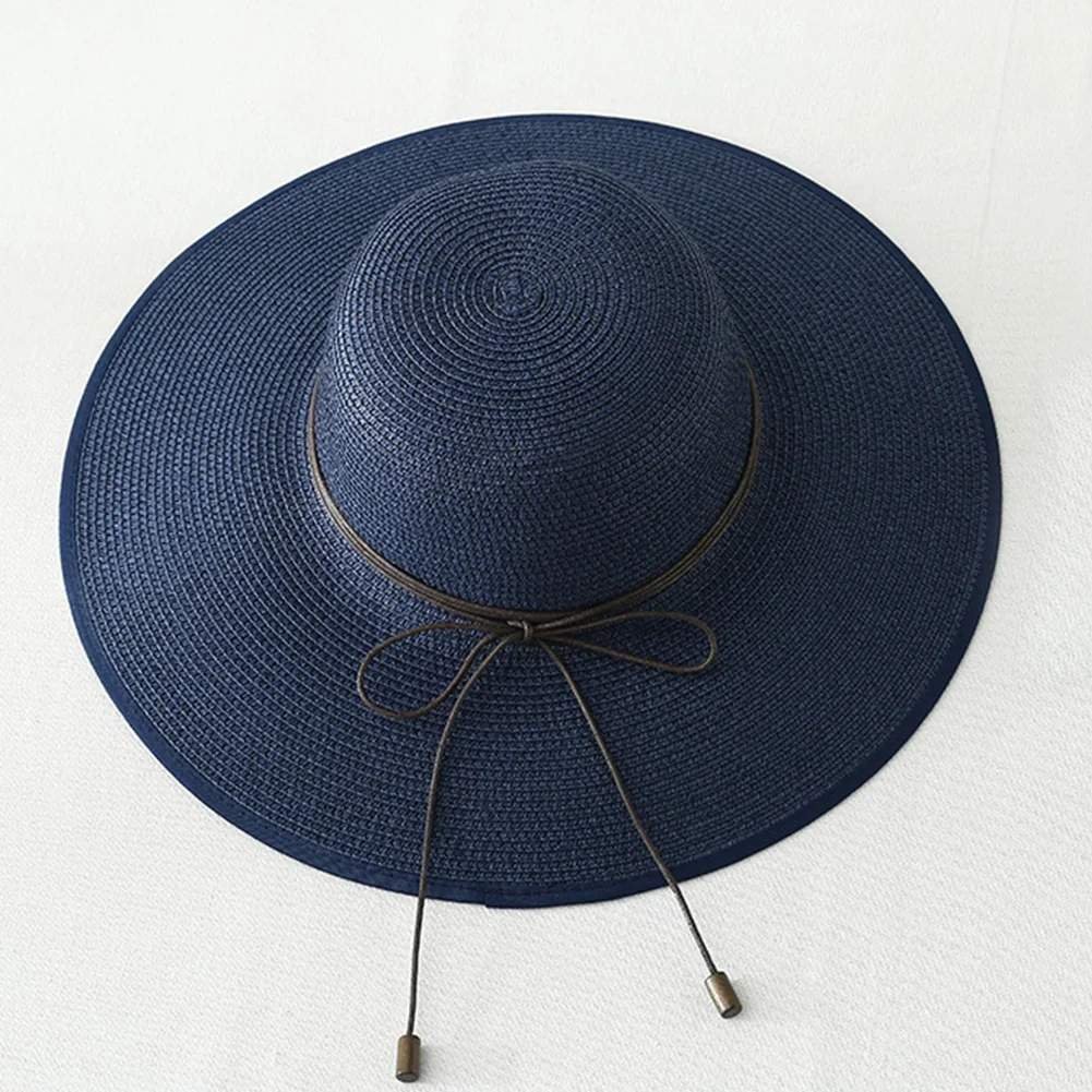النساء الأشعة فوق البنفسجية حماية بسيطة الصيف الشمس قبعة مرِنة Bowknot طوي الأزياء شاطئ كاب الواسعة الحافة في الهواء الطلق ظلة القش عارضة