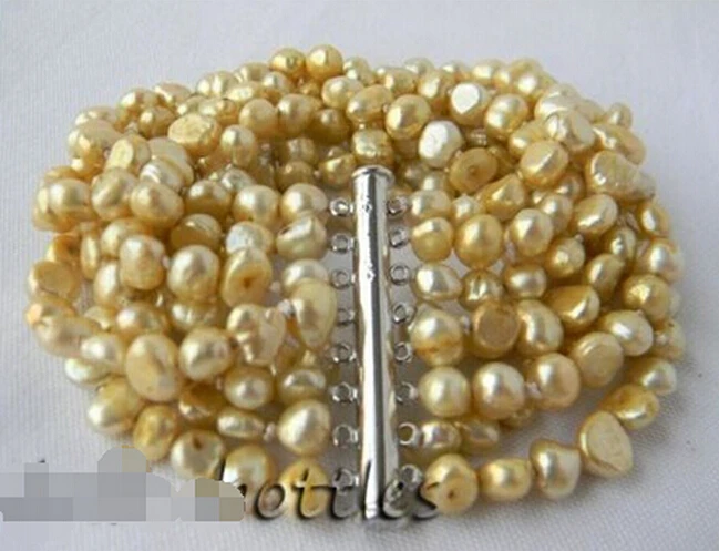 

Hot sell8Strands 6mm Champagne Baroque Freshwater Pearl Bracelet -Bridal jewelry free shipping