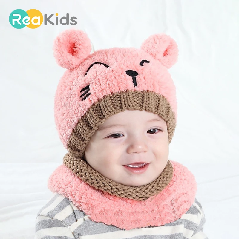 

REAKIDS Winter Cute Baby Beanies Hat With Scarf Warm Cartoon Children Hat For Boys Girls Knitted Ear Baby Beanies Hat Unisex