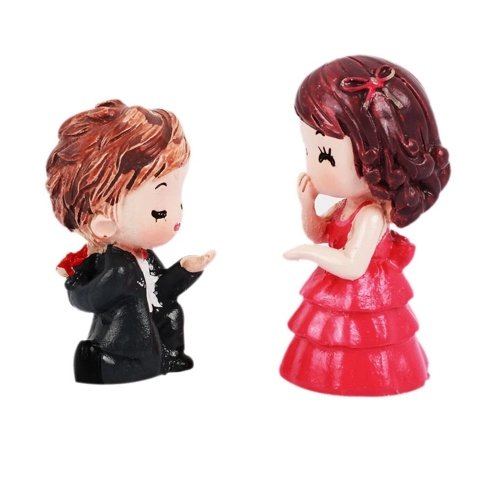 miniature couple dolls