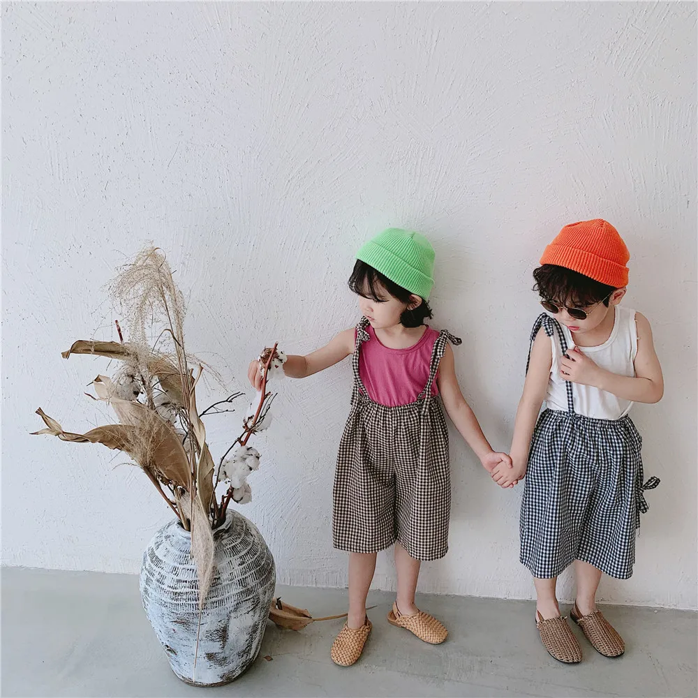 

Korean style boys girls fashion plaid wide leg overalls fashion children loose casual suspender cropped trousers