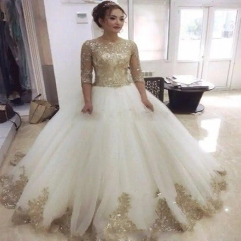red and gold gown with sleeves