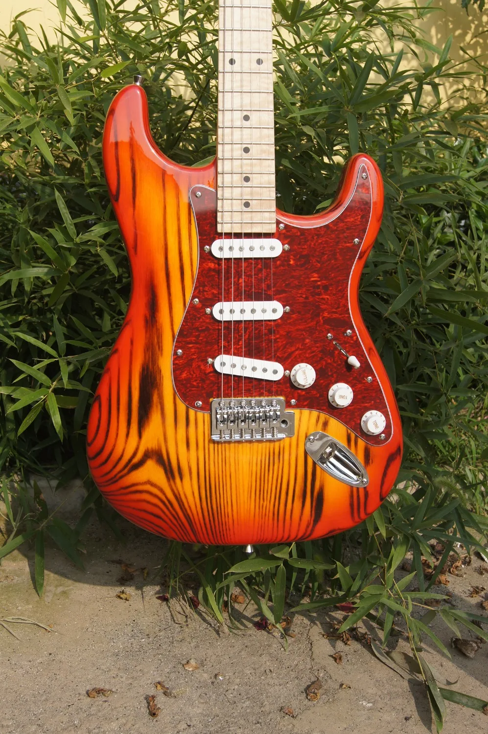 Ash battery electric guitar, carbonization process to deal with