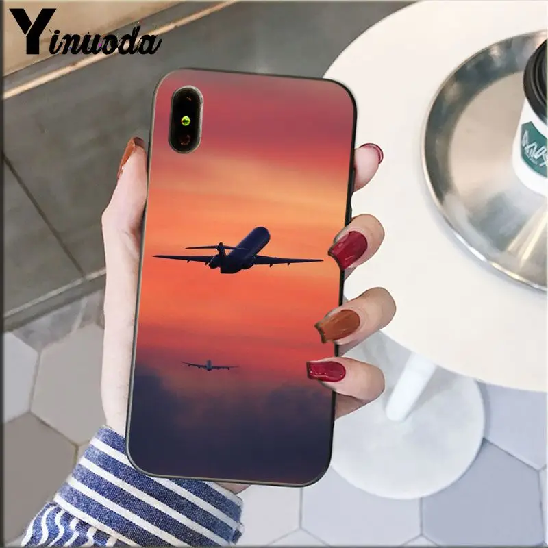 Airplane travel in the sunset