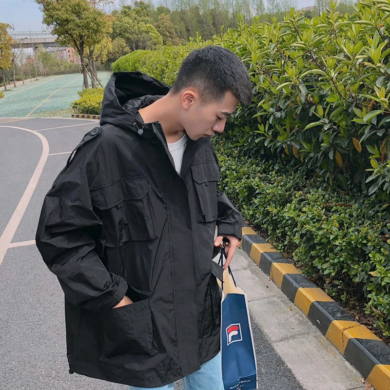 

2018 spring and summer new thin hooded jacket men's Korean version of the multi-bag loose casual jacket trend jacket