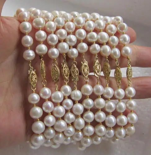 

Shipping >>>> wholesale 10PC AAA 8-9 MM SOUTH SEA WHITE PEARL BRACELET 7.5-8' 14K clasp