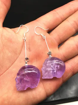 

Natural quartz crystal purple crystal skull earrings pendant healing.