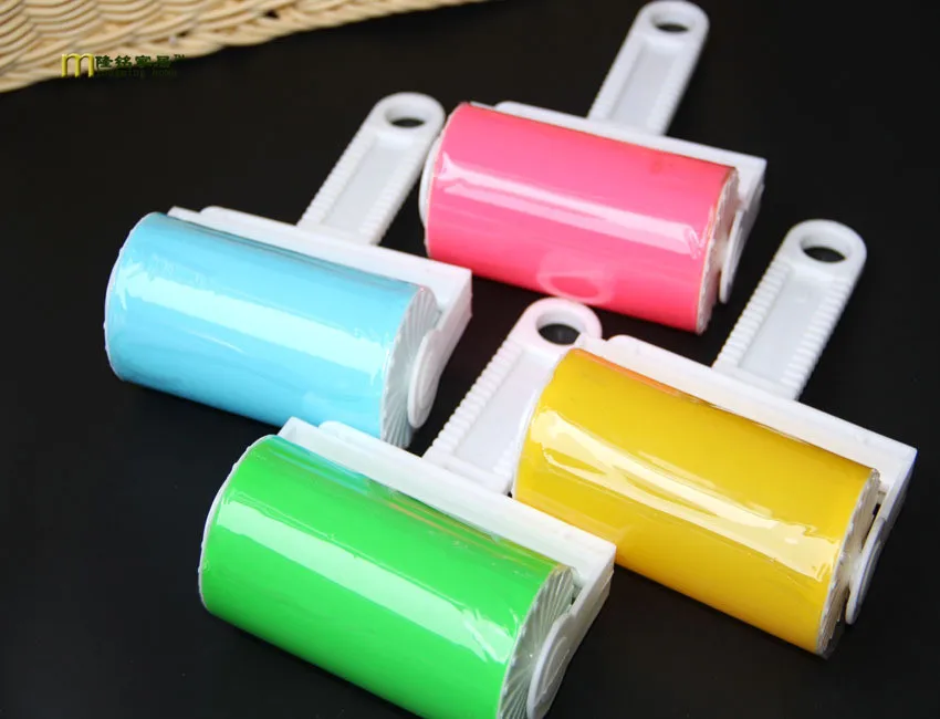 щетка-ролик для чистки одежды lint roller. моющийся липкий ролик для одежды. щетка-ролик для чистки одежды lint roller. липкий ролик многоразовый. ролик для чистки одежды от шерсти.