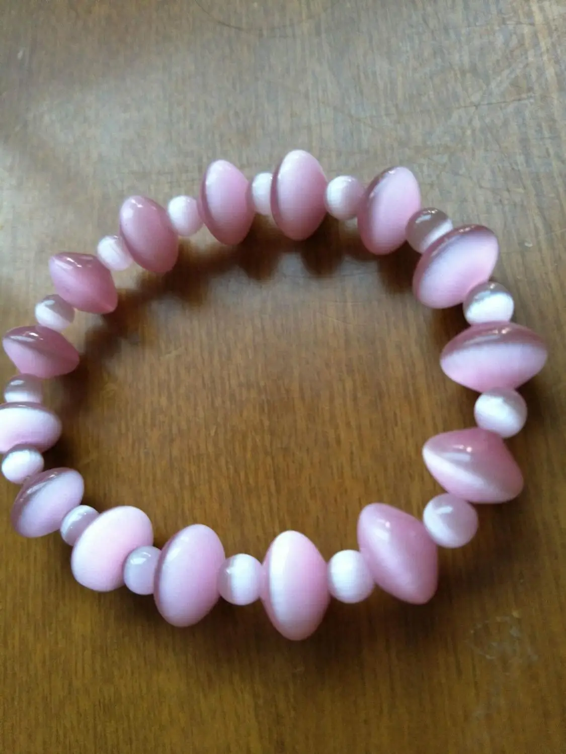 

Fashion beautiful Handmade pink Irregular Round elastic bracelet 7 '' 0344 28%