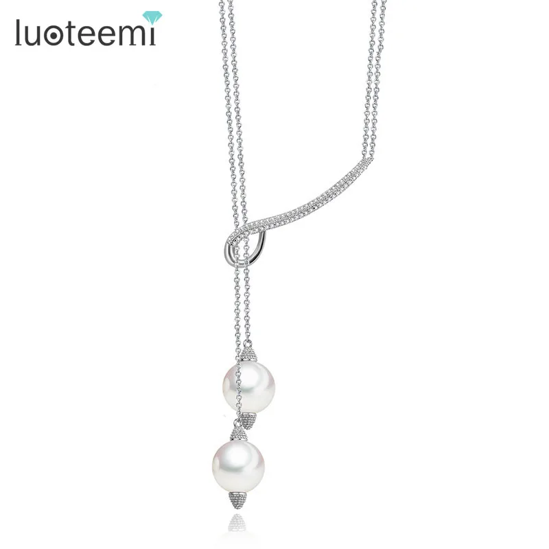 Prix pour LUOTEEMI Nouvelle Dame Fille Belle Long Double Imitation Perles Réglable Longueur Pendentif Collier pour les Femmes Bijoux CZ Bijoux Cadeaux Prix pour LUOTEEMI Nouvelle Dame Fille Belle Long Double Imitation Perles Réglable Longueur Pendentif Collier pour les Femmes Bijoux CZ Bijoux Cadeaux