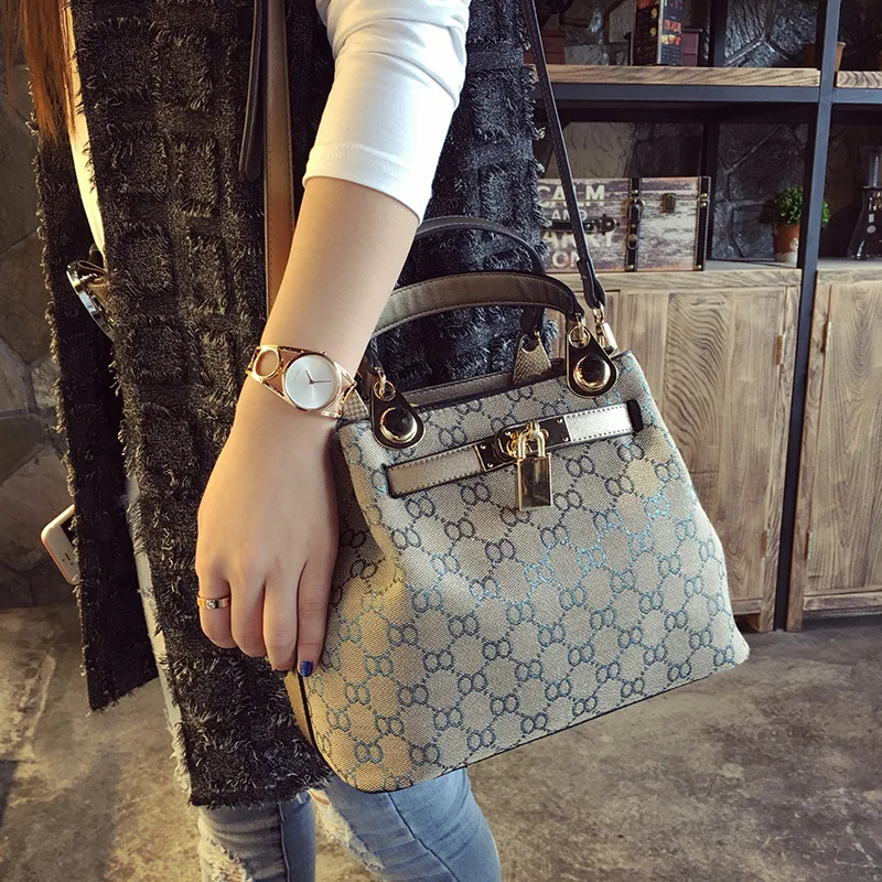 

Fashion Women 100% pure cowhide Female Geometry Bucket Bag Top-handle Day Clutches Casual Printing Shoulder Crossbody Bags Louis