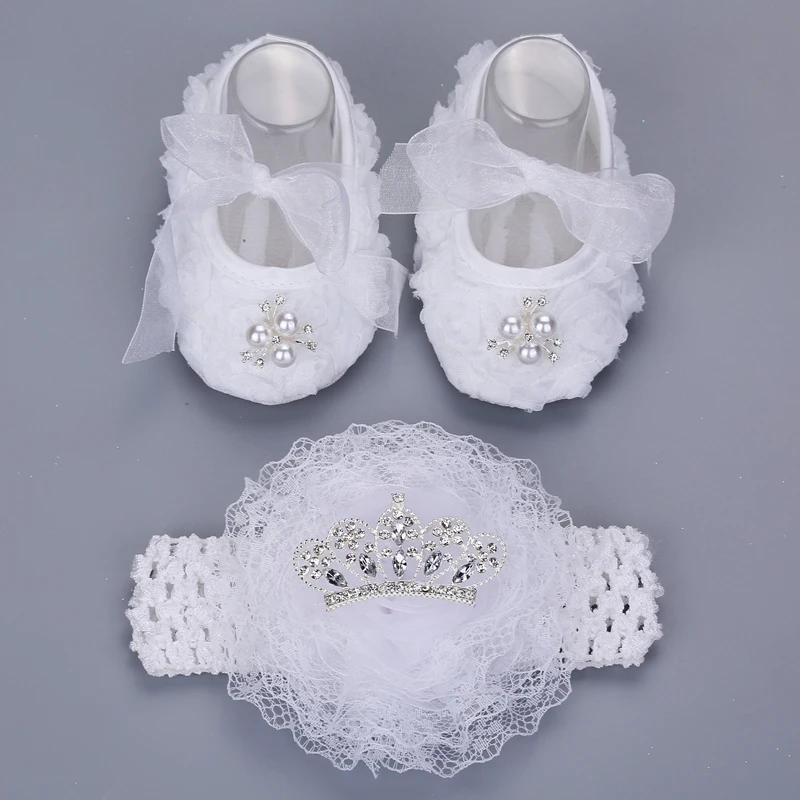 white newborn baby shoes