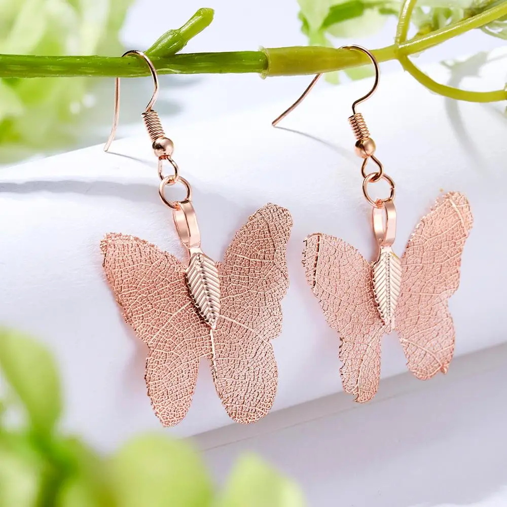 

Hot Fashion Butterfly Pendant Earrings Vintage Hollow Metal Natural Leaf Specimen Earrings Women Dangle Long Drop Earrings